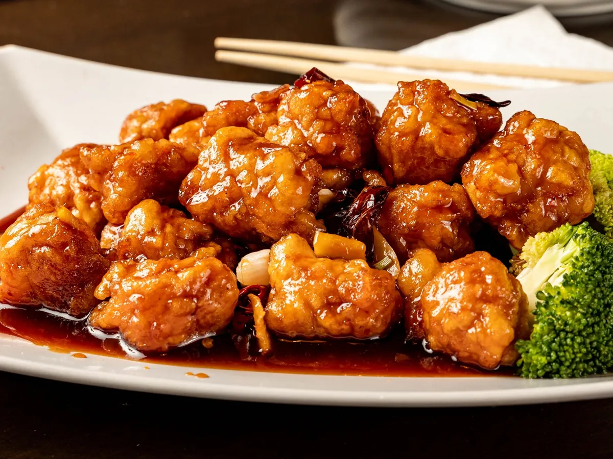 Braised spicy crispy chicken chunks with rich glossy sauce